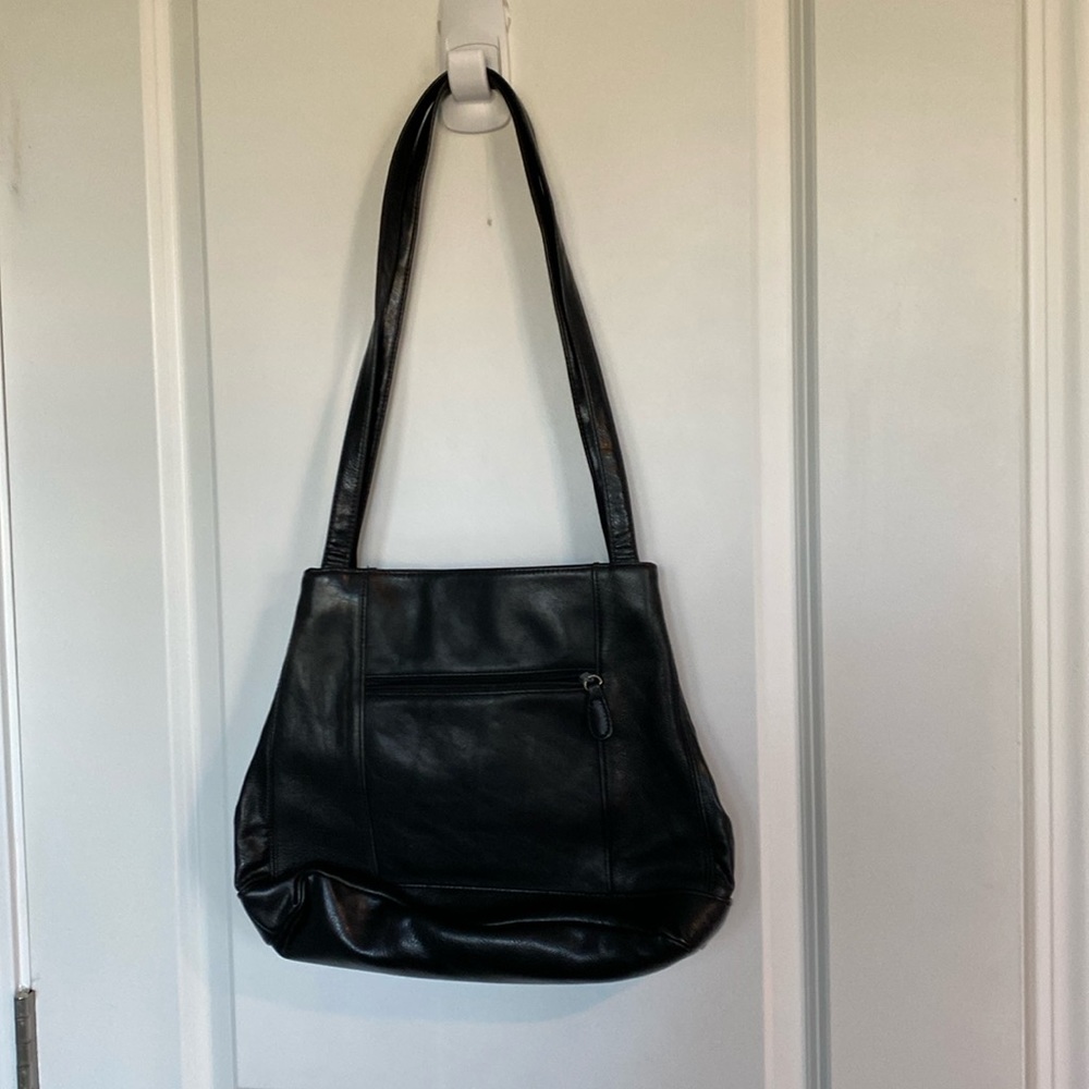 Over the shoulder leather purse with compartments inside